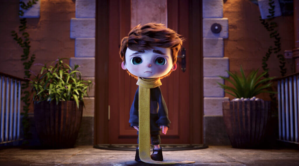 small kid with a yellow muffler around the neck and brown messy hair from the short film umbrella